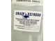 A closer view of a 'Drain Express' Plumbing sticker showing install date at 203 Standish Dr, Chapel Hill, NC 27517