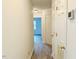 Neutral hallway with view into the living room and white trim at 203 Standish Dr, Chapel Hill, NC 27517