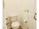 View of the toilet showing grab bar and paper towel holder at 203 Standish Dr, Chapel Hill, NC 27517