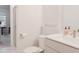 Modern bathroom featuring a white vanity, toilet, and glass-enclosed shower at 2089 Florine Dr, Apex, NC 27502