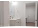 Bathroom featuring a modern vanity and sink with a view into the hallway at 2089 Florine Dr, Apex, NC 27502