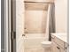 Bathroom with bronze fixtures, white cabinets, and a shower/tub combo at 2089 Florine Dr, Apex, NC 27502