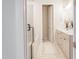 Elegant bathroom with a glass-enclosed shower, bathtub, double vanity, and neutral decor at 2089 Florine Dr, Apex, NC 27502
