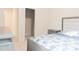 Bedroom with a stylish bed and dresser and doorway to the walk-in closet at 2089 Florine Dr, Apex, NC 27502
