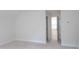 Simple bedroom showcasing neutral carpet and a window with great lighting at 2089 Florine Dr, Apex, NC 27502