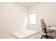 Bright bedroom featuring a desk, chair, and comfortable mattress on a carpeted floor near the window at 2089 Florine Dr, Apex, NC 27502