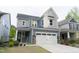 Charming two-story home with a two-car garage and stone accents at 2089 Florine Dr, Apex, NC 27502