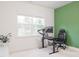 Bright office space with a large window, modern desk, and comfortable chair at 2089 Florine Dr, Apex, NC 27502