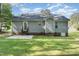 Exterior view of the house with a back door and patio at 2112 Ballston Pl, Knightdale, NC 27545