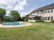 Expansive backyard featuring an in-ground pool, gazebo, and screened porch, perfect for outdoor living at 212 Listening Ridge Ln, Cary, NC 27519