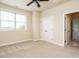 Bedroom featuring neutral walls, carpet, double doors and natural light at 212 Listening Ridge Ln, Cary, NC 27519