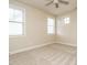Bedroom featuring neutral walls, carpet, and natural light at 212 Listening Ridge Ln, Cary, NC 27519