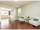 Stylish living room with hardwood floors, neutral paint, and comfortable seating area at 212 Listening Ridge Ln, Cary, NC 27519