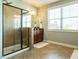Elegant main bathroom featuring glass shower and granite-topped vanity at 212 Listening Ridge Ln, Cary, NC 27519