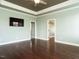 Large main bedroom featuring hardwood floors, recessed lighting and ensuite bath at 212 Listening Ridge Ln, Cary, NC 27519