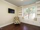 Cozy office features a window seat, custom shelves, and a large window with natural light at 212 Listening Ridge Ln, Cary, NC 27519