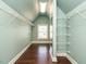Well-organized walk-in closet with ample shelving and natural light at 212 Listening Ridge Ln, Cary, NC 27519