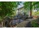 View of backyard and deck featuring inviting outdoor seating and stairs at 213 Beechtree Dr, Cary, NC 27513