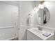 Clean and bright bathroom featuring a white vanity, sink, and modern fixtures at 213 Beechtree Dr, Cary, NC 27513