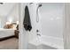 Ensuite bathroom with a shower-tub combo featuring white walls at 213 Beechtree Dr, Cary, NC 27513