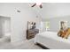 Bright bedroom features neutral carpet, light gray walls, and a view of an ensuite bath at 213 Beechtree Dr, Cary, NC 27513