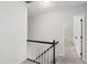 Upstairs hallway with view to hallway and bedroom at 213 Beechtree Dr, Cary, NC 27513