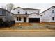 New construction home featuring a two-car garage in a residential neighborhood during construction at 2214 Cherry Creek Rd, Haw River, NC 27258
