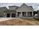 Charming two-story home showcasing a spacious two-car garage and inviting front porch at 2320 Eagle Shot Ct # 20, Fuquay Varina, NC 27526