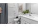Bright bathroom with sleek fixtures, ceramic tile flooring, and a shower-tub combo at 2736 Luxborough Ln, Mebane, NC 27302