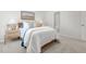 Bedroom with bed, nightstand with lamps, framed art, and an ensuite bathroom at 2739 Luxborough Ln, Mebane, NC 27302