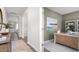 Bright entryway leading to a home office, showcasing an open floor plan and elegant design elements at 2739 Luxborough Ln, Mebane, NC 27302