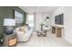 Cozy living room features a comfortable couch, tv, and lots of natural light at 2739 Luxborough Ln, Mebane, NC 27302