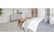 Bright primary bedroom featuring a dresser, decor, mirrors, and an ensuite bathroom at 2739 Luxborough Ln, Mebane, NC 27302