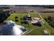 Aerial shot showing a pond, large field, house and barn with rural acreage at 2747 Beasley, Benson, NC 27504