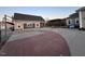 A circular driveway and detached garage featuring a basketball goal at 2747 Beasley, Benson, NC 27504