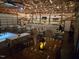Large event space with exposed timber ceiling and decorative lighting at 2747 Beasley, Benson, NC 27504
