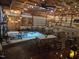 Large event space with exposed timber ceiling and decorative lighting at 2747 Beasley, Benson, NC 27504