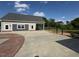 Well-maintained building exterior with paved parking and grassy yard at 2747 Beasley, Benson, NC 27504