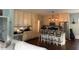 Bright kitchen with island seating, stainless steel appliances and ample storage space at 2747 Beasley, Benson, NC 27504