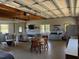 Spacious living area in a garage, featuring a cozy sitting area, kitchenette, and dining space at 2747 Beasley, Benson, NC 27504