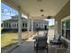 Covered porch overlooking grassy backyard at 2747 Beasley, Benson, NC 27504