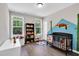 Bedroom with crib, toy bookcase, and a red panda mural at 2784 Norrington Rd, Lillington, NC 27546