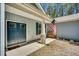 Welcoming front entry with a charming porch and an American flag, perfect for a patriotic homeowner at 2784 Norrington Rd, Lillington, NC 27546