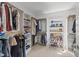 This walk-in closet has organizers for clothes, shoes, and accessories at 2817 Peachleaf St, Raleigh, NC 27614