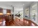 Spacious kitchen and breakfast nook area featuring hardwood floors and abundant natural light at 2817 Peachleaf St, Raleigh, NC 27614