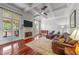 Comfortable living room featuring a fireplace, coffered ceilings and hardwood floors at 2817 Peachleaf St, Raleigh, NC 27614