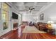Spacious living room featuring a fireplace, coffered ceilings and hardwood floors at 2817 Peachleaf St, Raleigh, NC 27614