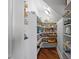 Well-organized pantry with ample shelving for storage at 2817 Peachleaf St, Raleigh, NC 27614