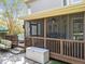 Relaxing screened porch with fan, dining table, and backyard views provides the ultimate space for relaxation at 2817 Peachleaf St, Raleigh, NC 27614