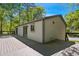 Spacious wood deck showcasing the exterior of the house with a view of the backyard at 313 Crown Oaks Dr, Raleigh, NC 27615